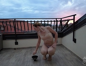 060723_hot_ginger_fire_dancing_nude_at_sunset_while_on_vacation