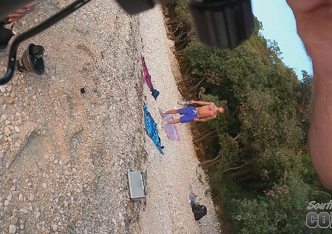 070122_hot_skinny_model_lea_fire_dancing_at_sunset_while_on_vacation