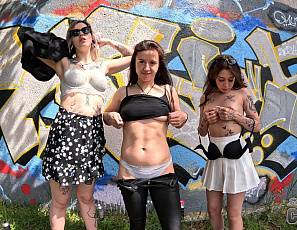 081025_3_hot_friends_gabriela_lati_sam_and_dora_spraying_graffiti_on_abandoned_building_in_the_forest