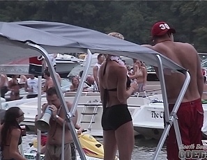 083103_lake_of_the_ozarks_girls_showing_skin_while_partying_boat_orgy