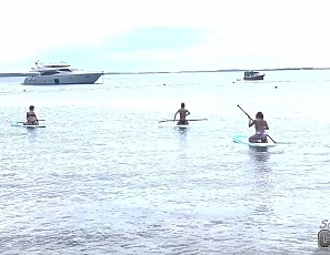 091022_hot_bikini_babes_flashing_boobs_while_standup_paddle_boarding_and_sunbathing_nude_on_the_beach